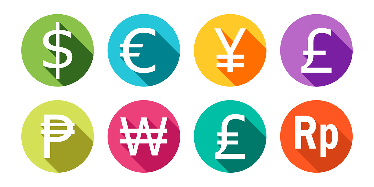 Symbole für Pfund Euro, Yen und US-Dollar