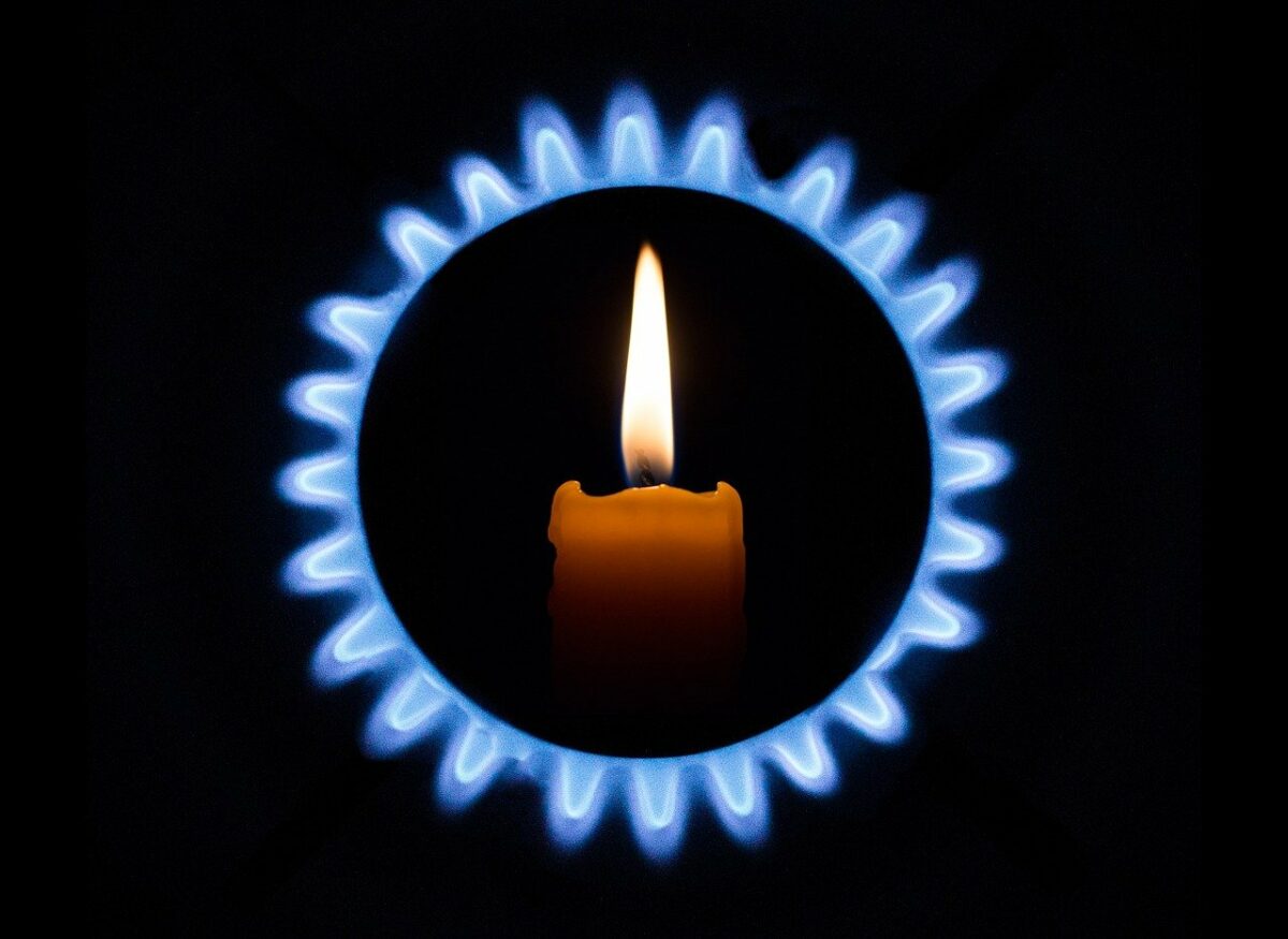 Gas-Flamme und Kerze