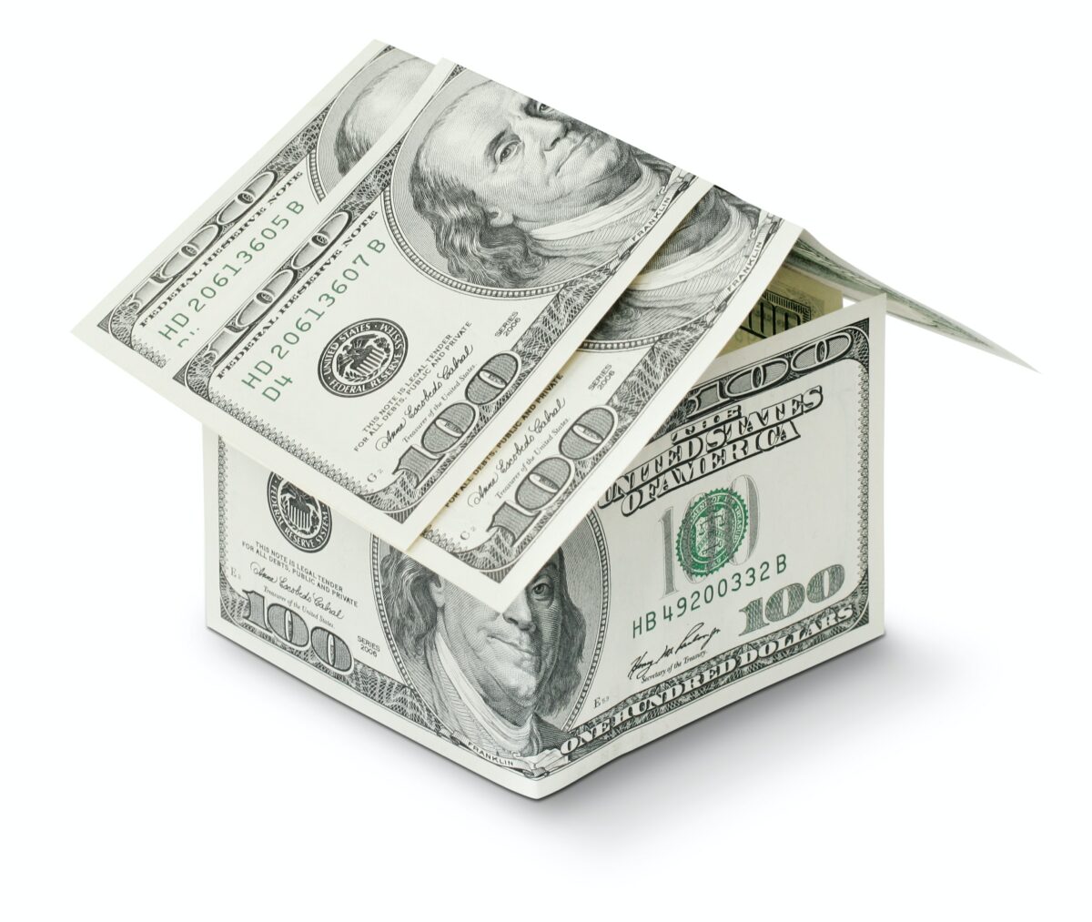 US-Dollar Geldscheine zu einem Haus gefaltet