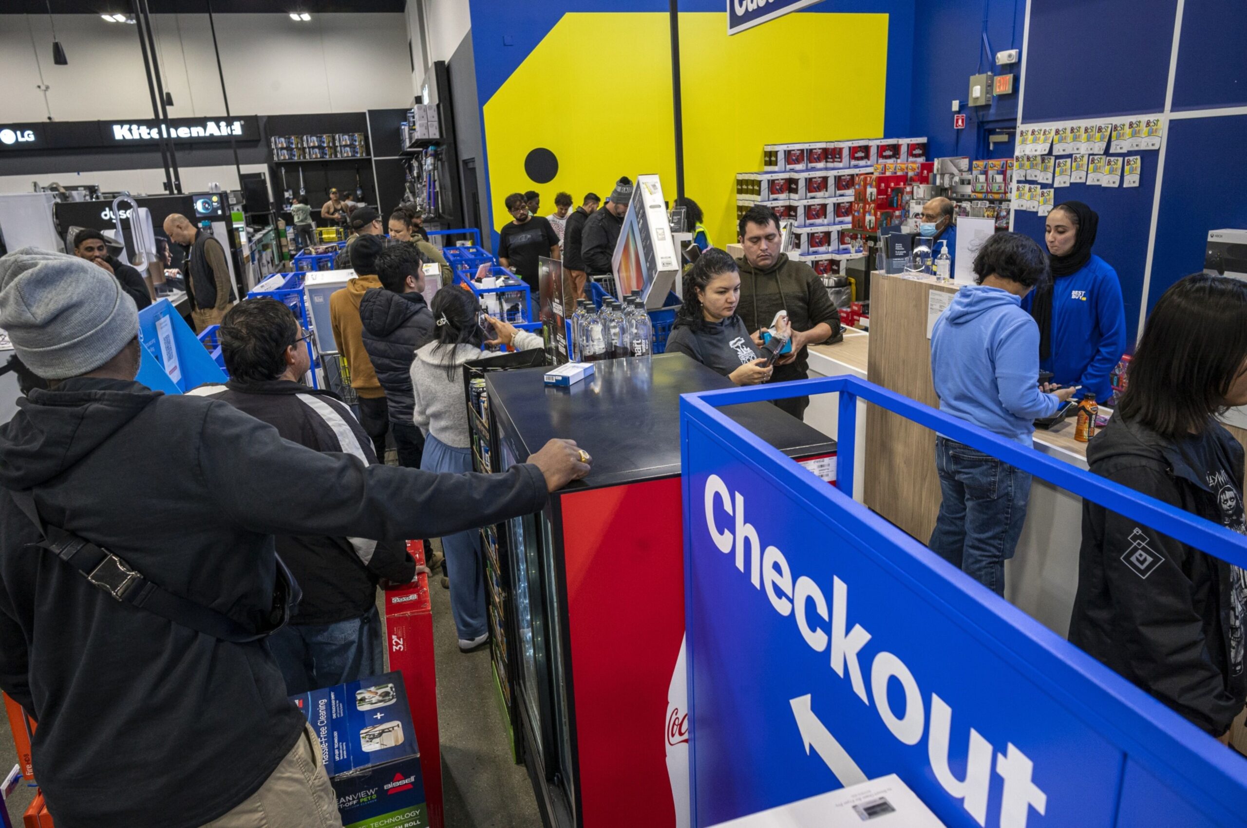 Shoppers wait to check out out a Best Buy store in Union City, California, during this year’s Black Friday