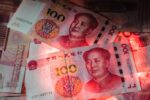 China Warnzeichen für Wirtschaft Yuan wertet ab
